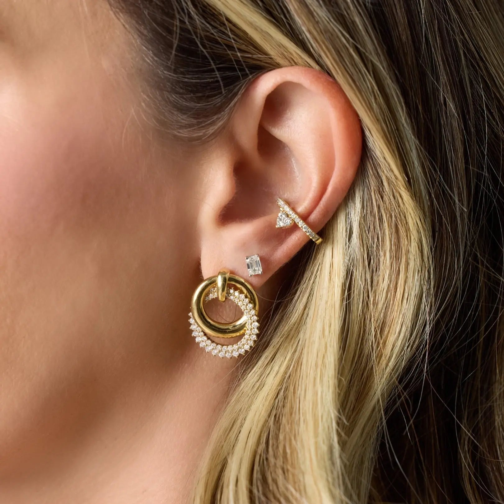 Yellow gold interlocking hoops with pavé diamonds