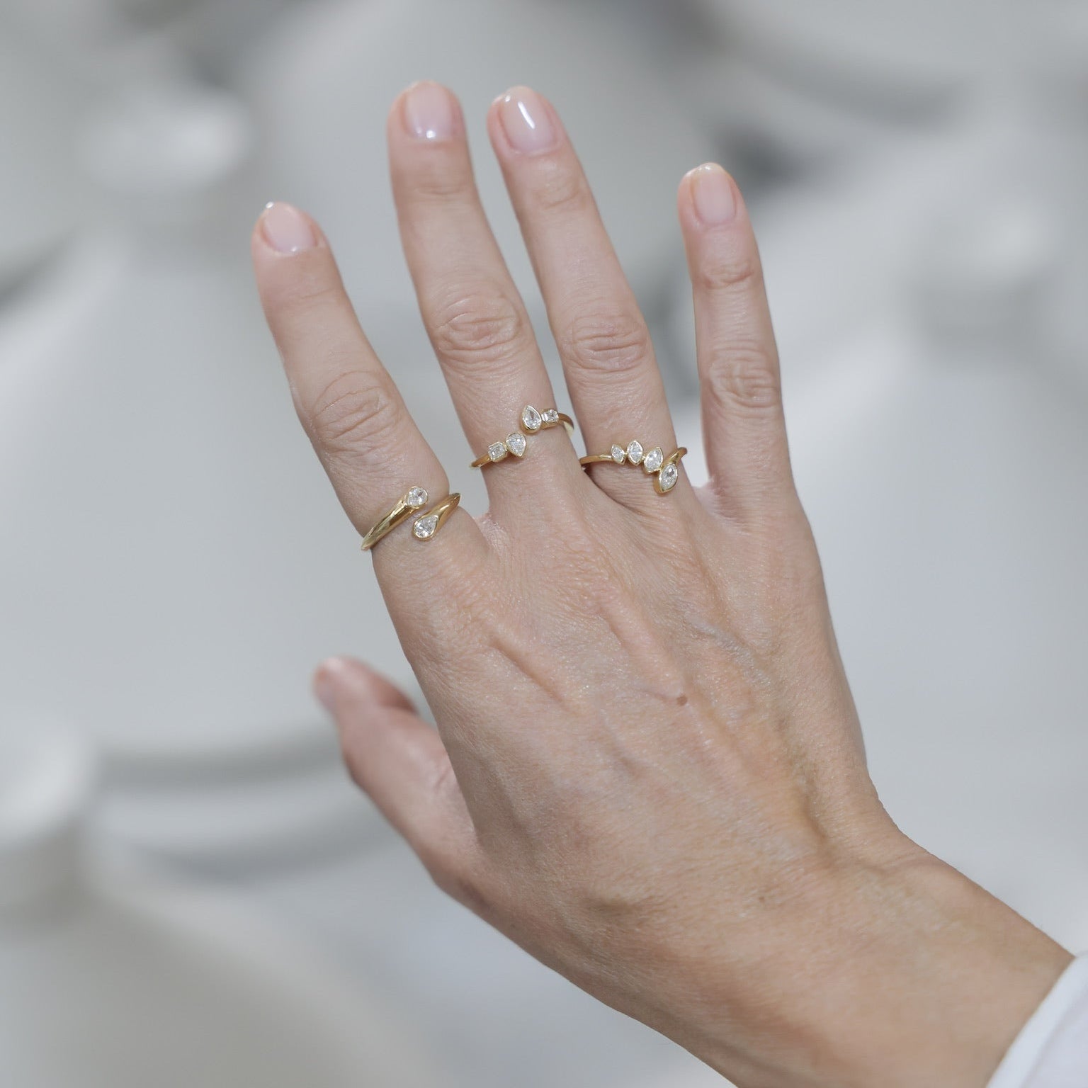 Open Bezel Diamond Ring with Pear & Emerald-Cut Shapes in 18K Yellow or White Gold