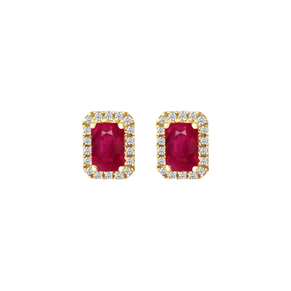 Ruby halo stud earrings framed by diamonds in 18K yellow gold