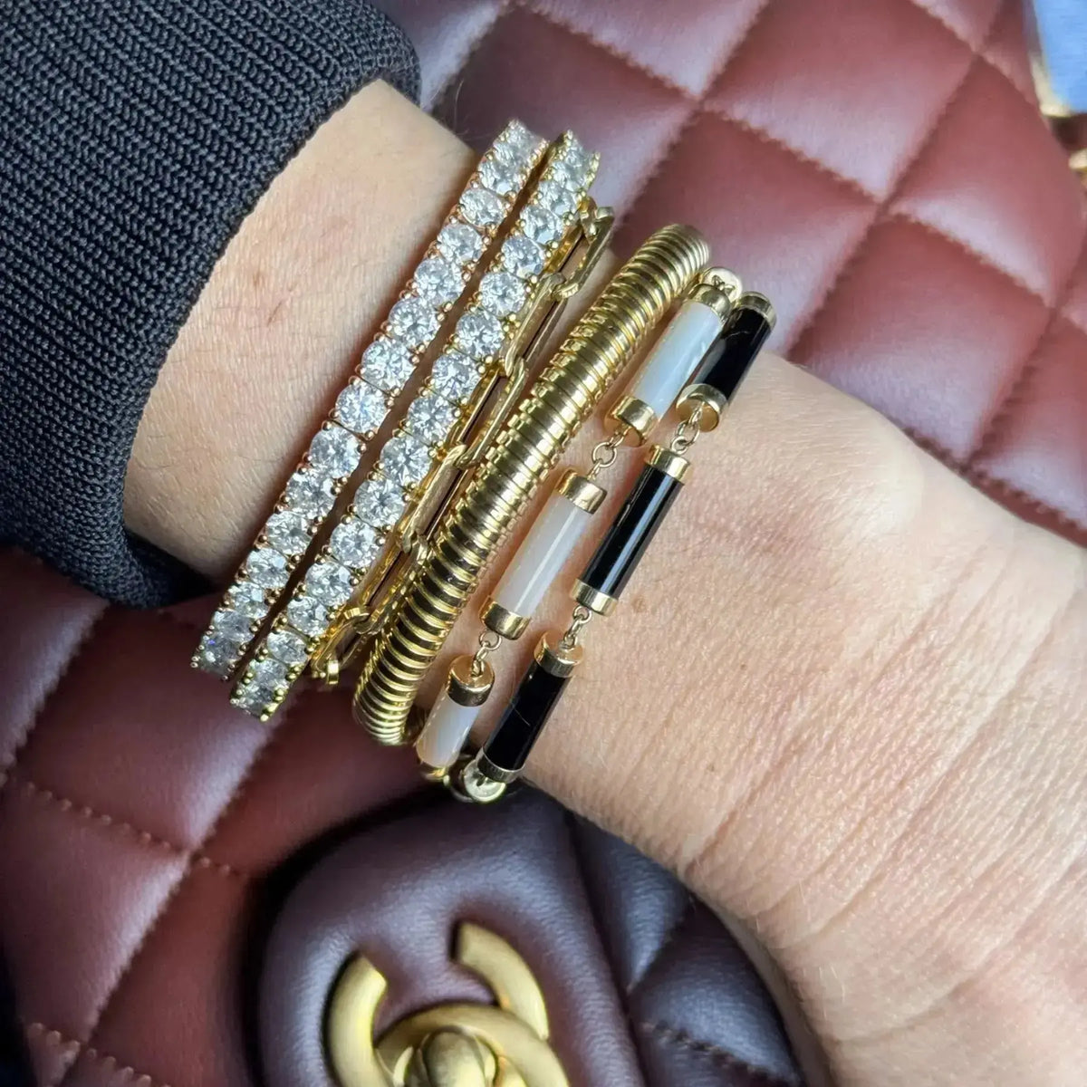 Half-Eternity Flexible Diamond Bangle in 18K Gold | JJ Jewelry Miami