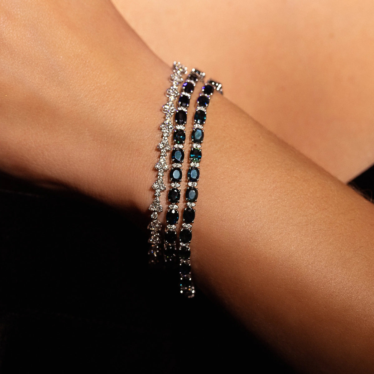 Oval Blue Sapphire and Diamond Line Bracelet in 18K white gold, lifestyle view 1 | JJ Jewelry