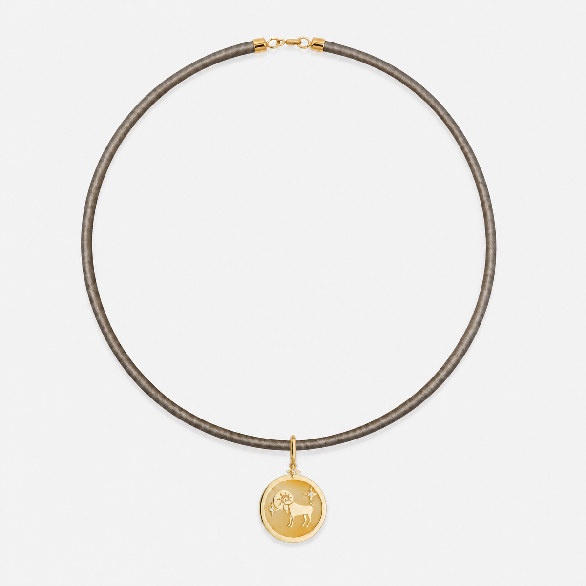 Aries Zodiac Pendant in 18K Yellow Gold with Orange Quartz & Diamonds, styled on a taupe cord choker | JJ Jewelry Miami