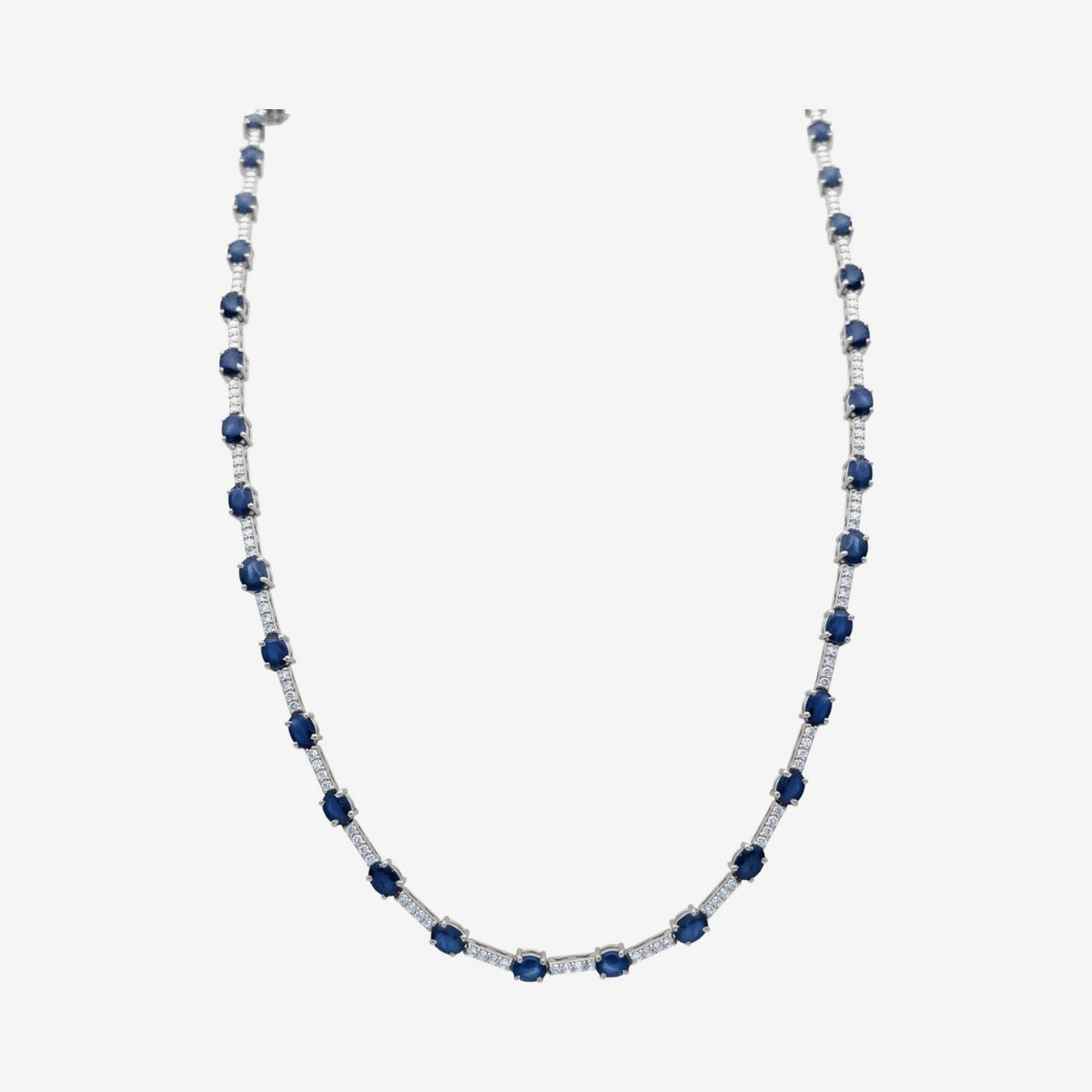 Blue Sapphire and Diamond Station Necklace in 14K White Gold, gray background | JJ Jewelry Miami