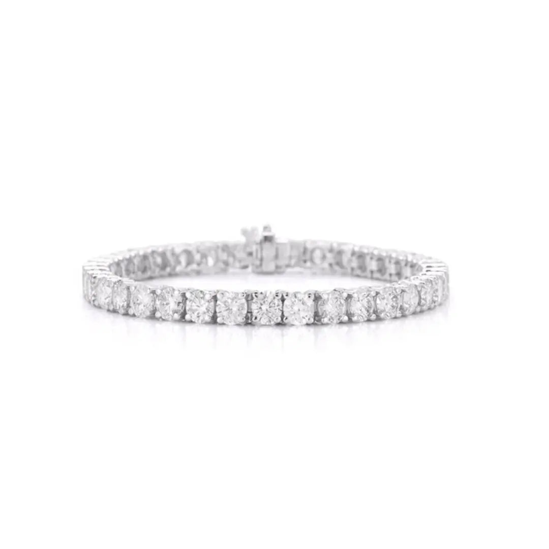 Classic diamond tennis bracelet in 18K gold by JJ Jewelry