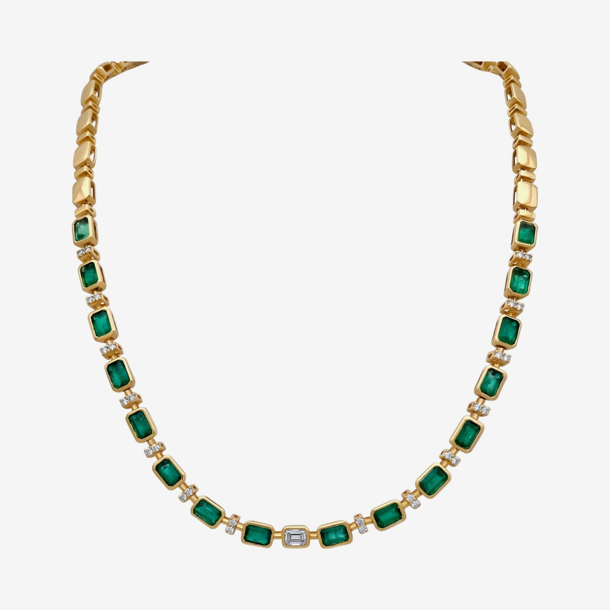 Emerald and Diamond Lariat Necklace in 18K Yellow Gold, gray background | JJ Jewelry Miami