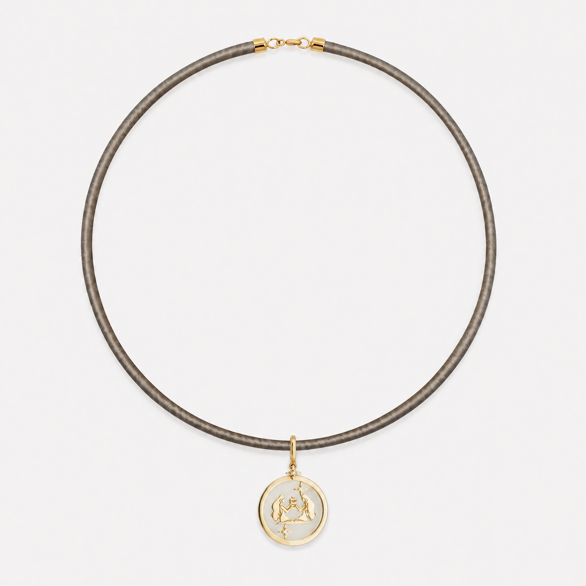 Gemini Zodiac Pendant with White Quartz & Diamonds in 18K Yellow Gold, styled on a taupe cord choker | JJ Jewelry