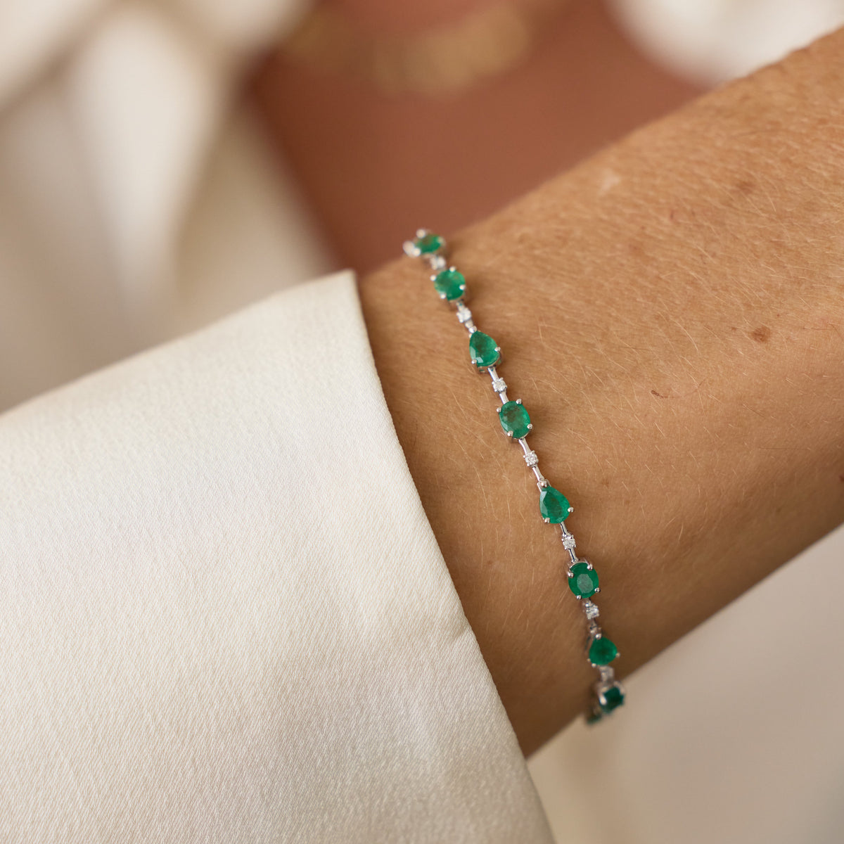 Oval and Pear Emerald and Diamond Bracelet, lifestyle view 2 | JJ Jewelry