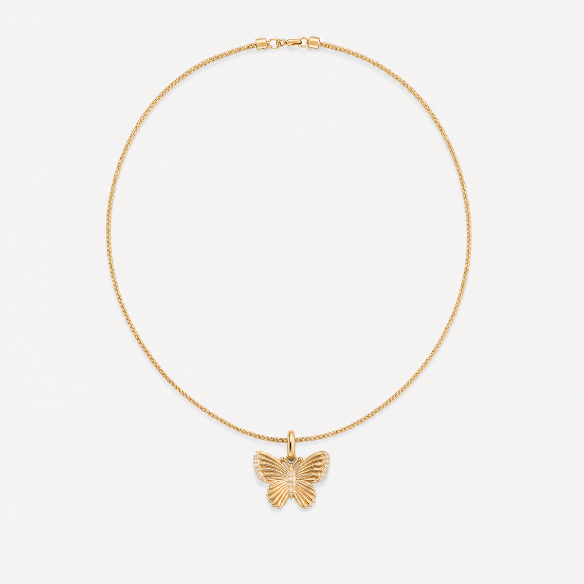 Pavé Diamond Butterfly Pendant in 14K Yellow Gold, on a fine gold chain | JJ Jewelry Miami