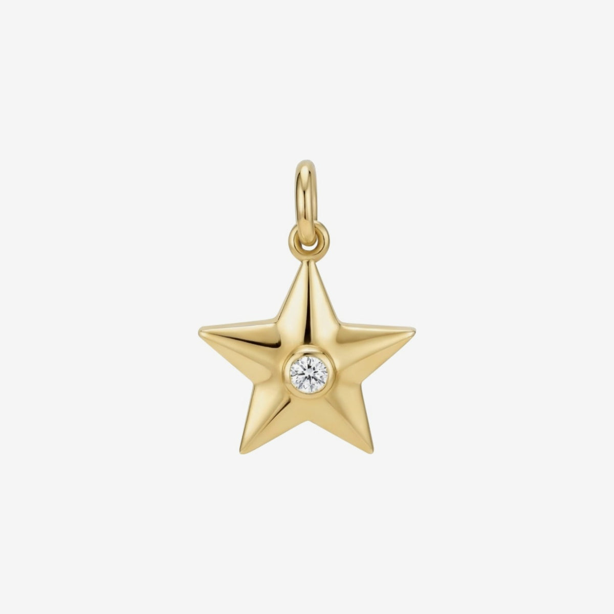 Puffed Gold Star Pendant with Diamond in 14K Yellow Gold, gray background | JJ Jewelry Miami