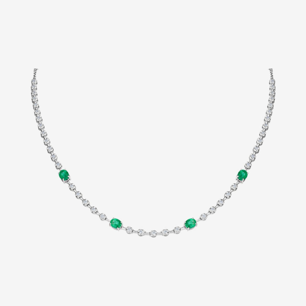 Renata Necklace with Emeralds and Diamonds in 18K White Gold, gray background | JJ Jewelry Miami