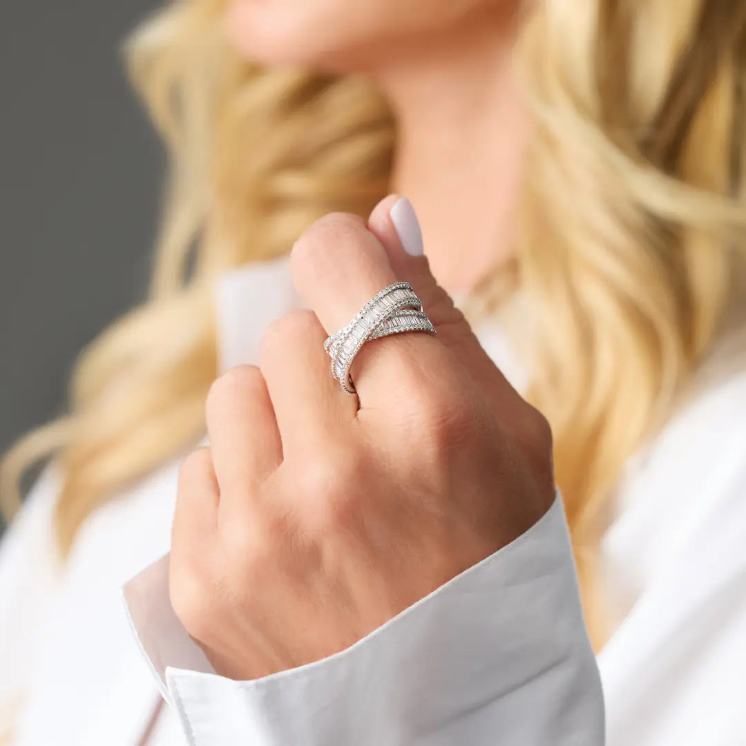 White gold wrap ring with baguette and brilliant diamonds