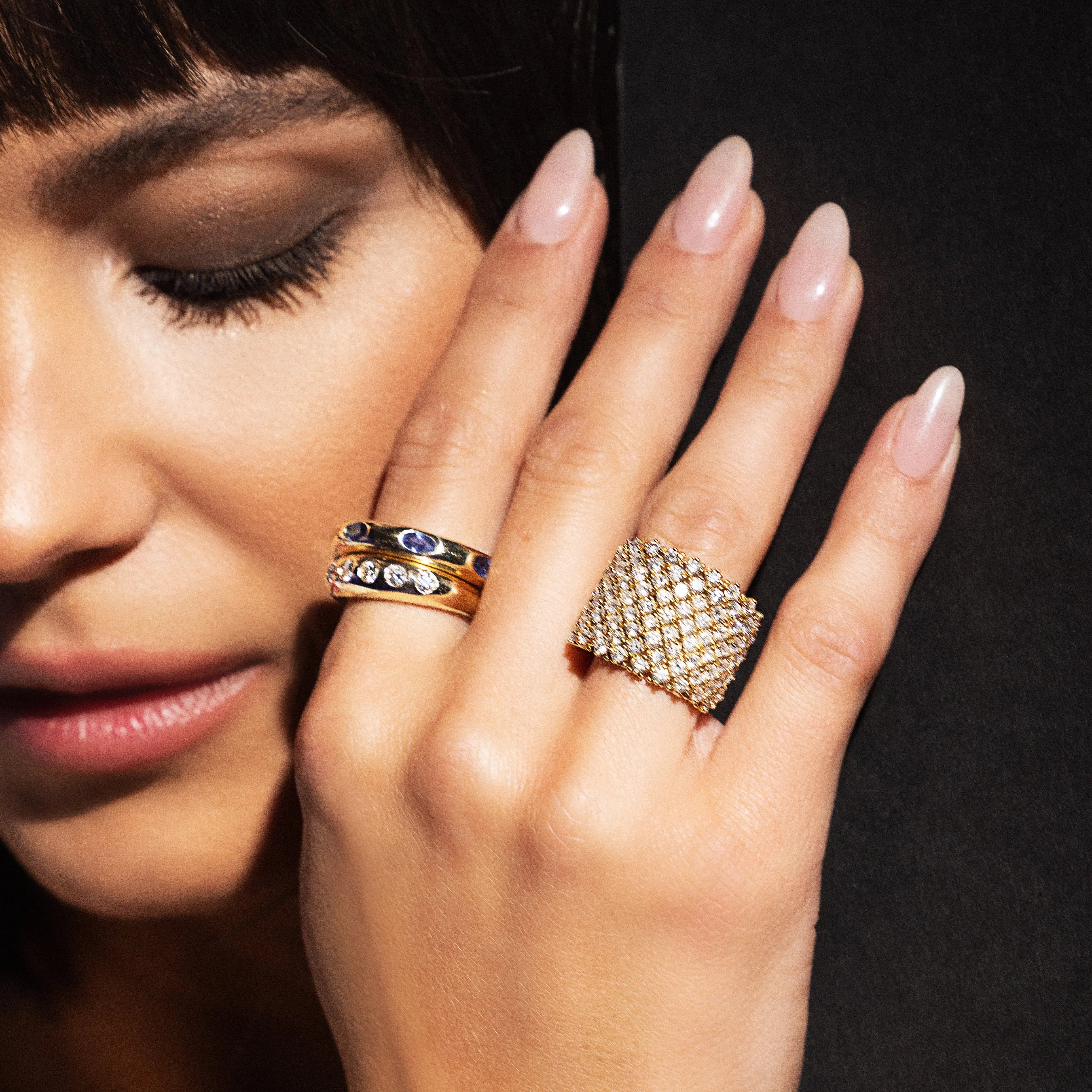 14K yellow gold gypsy dome ring with blue sapphires