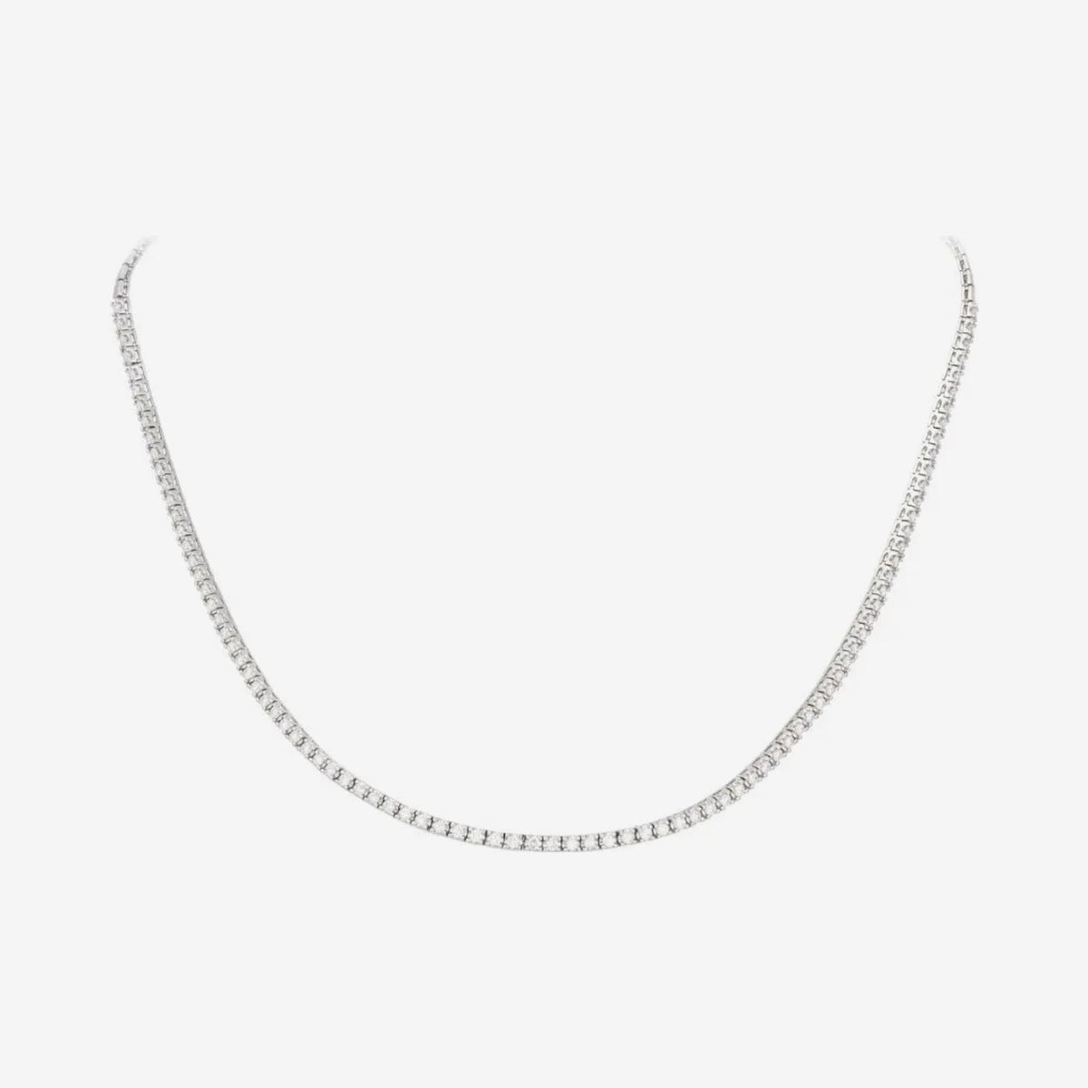 Carol Diamond Tennis Necklace in 18K Gold, gray background | JJ Jewelry Miami