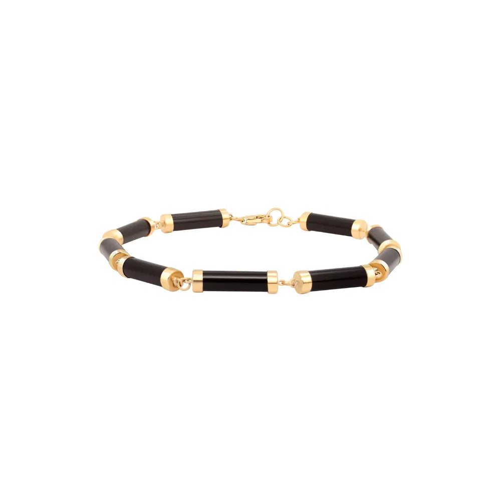 Cylinder bracelet in 14K yellow gold with onyx accents by JJ Jewelry