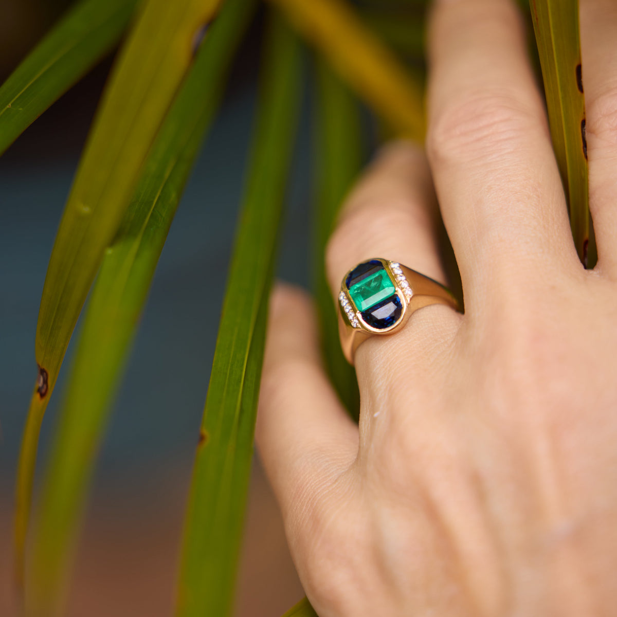 Emerald and Half-Moon Blue Sapphire Ring in 18K Yellow Gold, view 5 | JJ Jewelry Miami