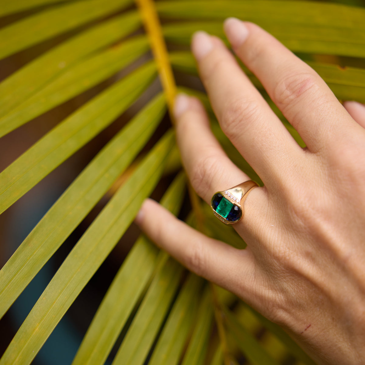 Emerald and Half-Moon Blue Sapphire Ring in 18K Yellow Gold, view 4 | JJ Jewelry Miami