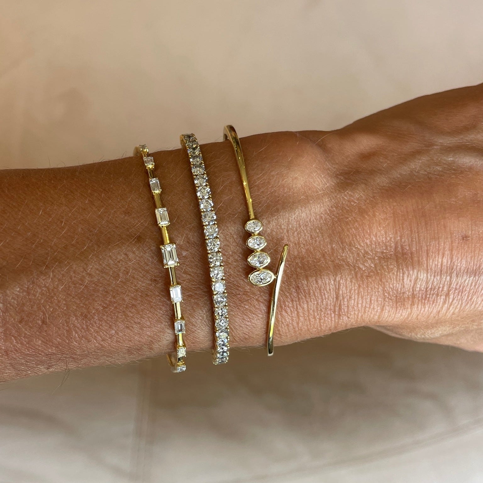 Four Oval Diamond Bezel Bangle