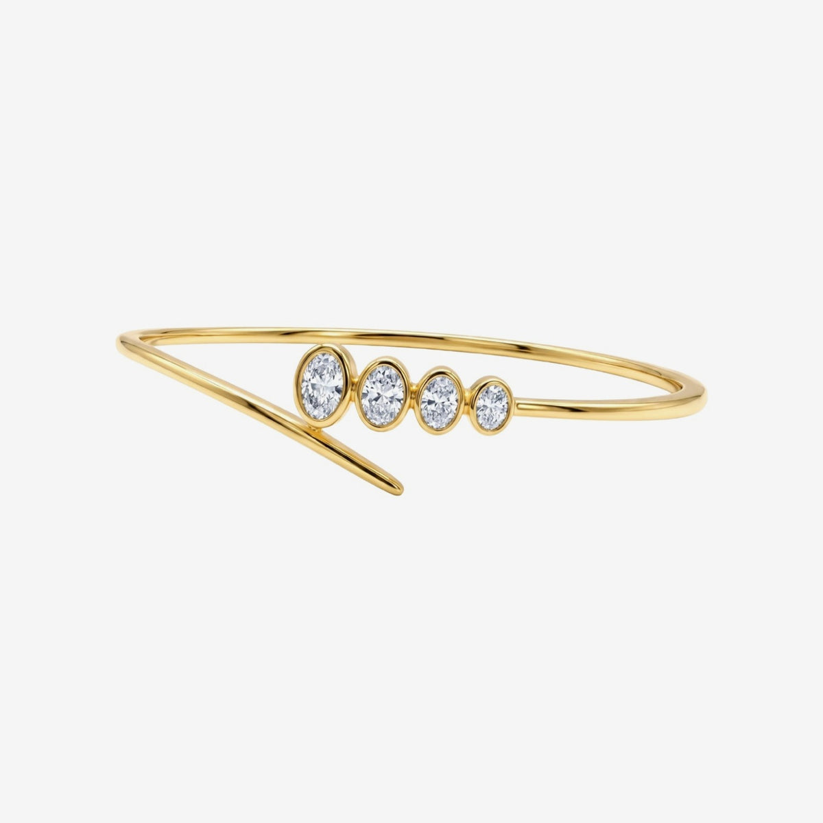 Four Oval Diamond Bezel Bangle in 14K yellow gold | JJ Jewelry