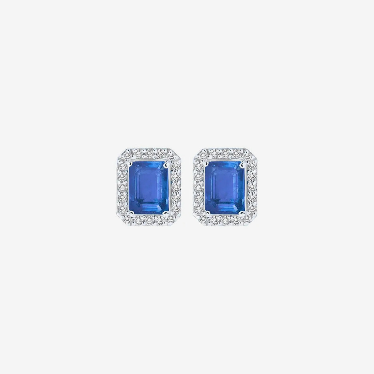 Gemstone and Diamond Halo Stud Earrings in 18K White Gold with Tanzanite, gray background | JJ Jewelry Miami