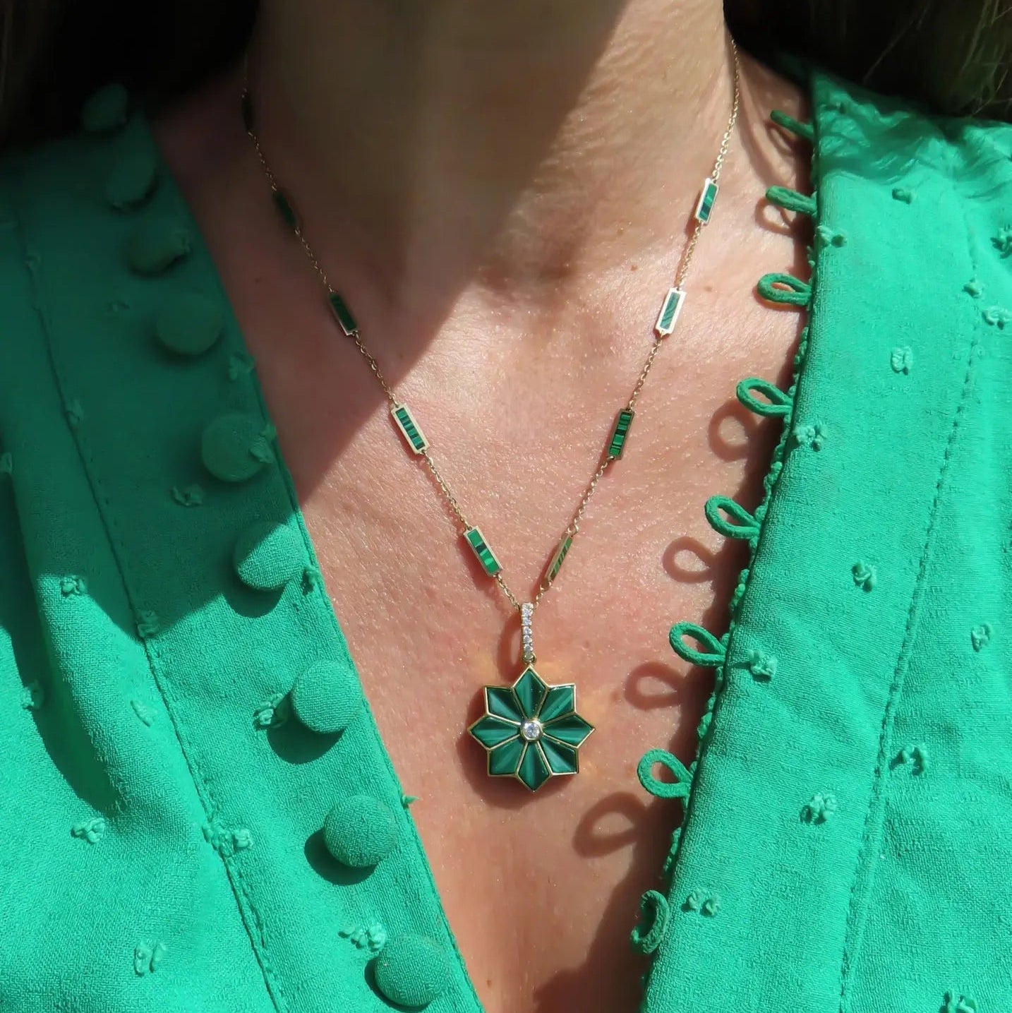 Malachite flower pendant with diamond center in 18K yellow gold by JJ Jewelry