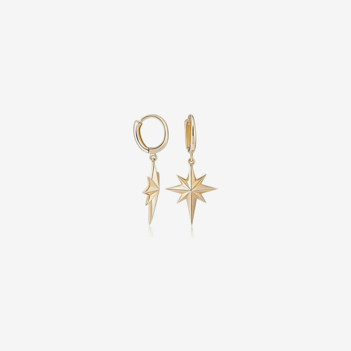 North Star Huggie Earrings in 14K Yellow Gold, gray background | JJ Jewelry Miami