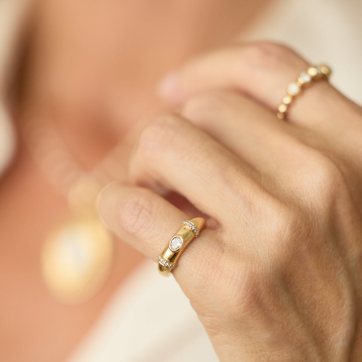 Oval Diamond Bezel Pinky Ring in 18K Yellow Gold