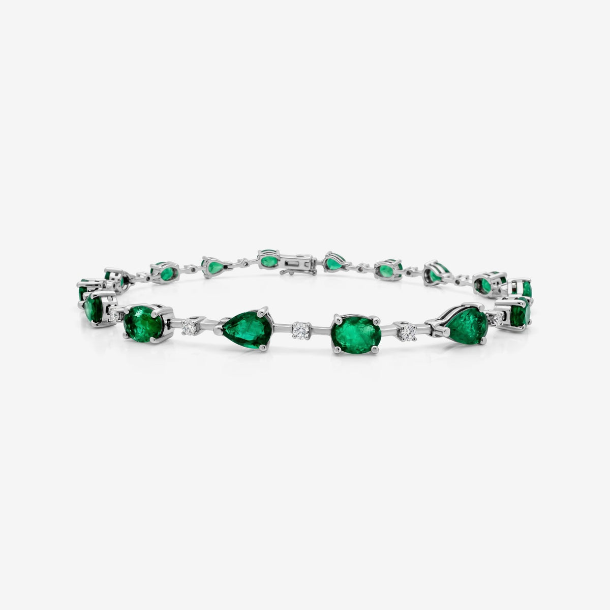 Oval & Pear Emerald and Diamond Bracelet in 18K White Gold | JJ Jewelry Miami