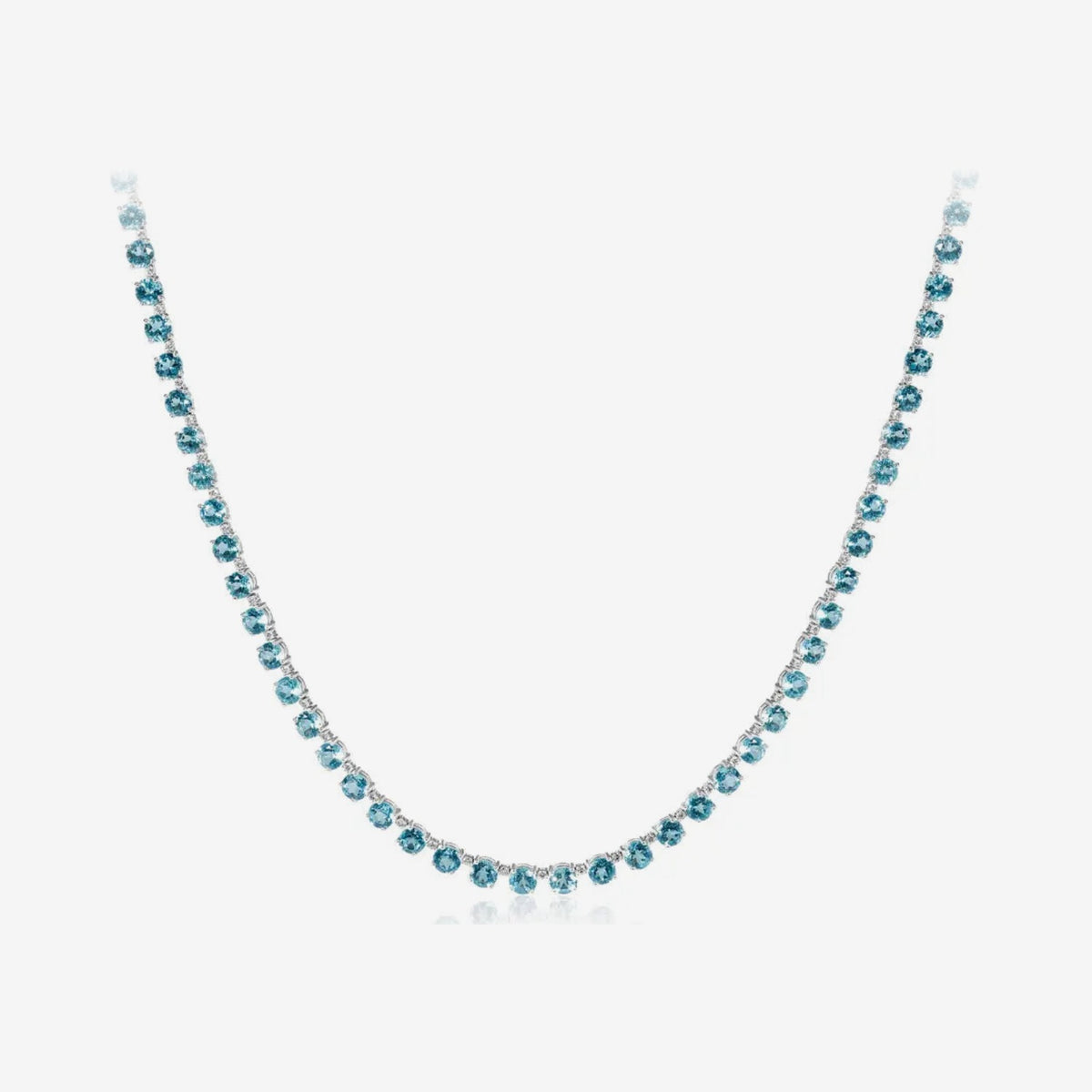 Round Blue Topaz and Diamond Strand Necklace in 18K White Gold, gray background | JJ Jewelry Miami