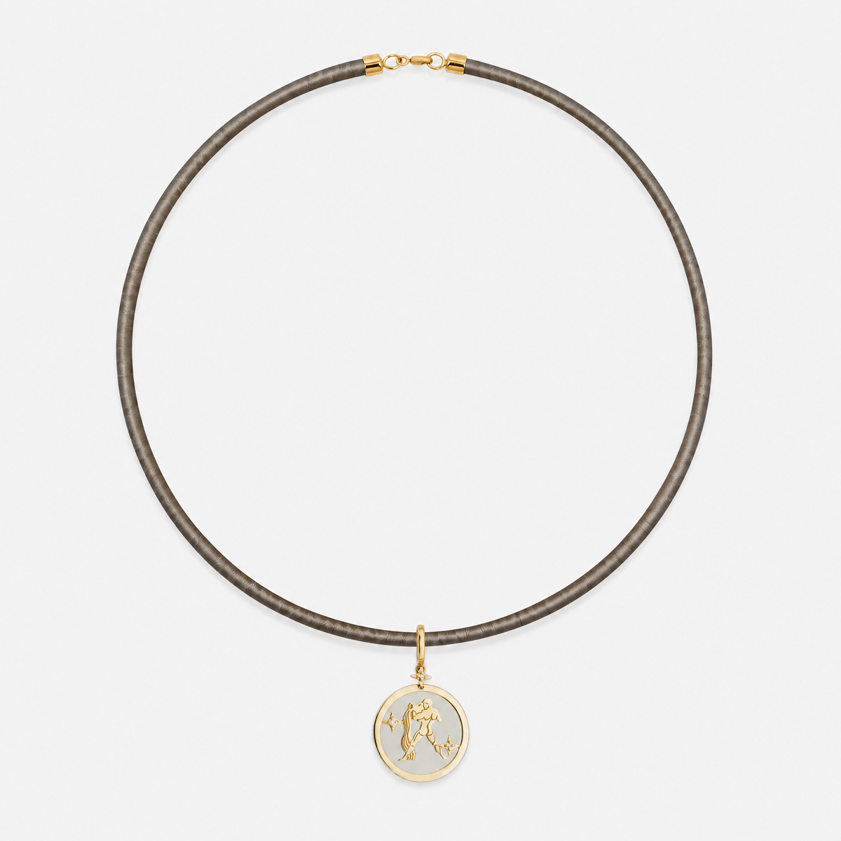 Aquarius Zodiac Pendant with White Quartz & Diamonds in 18K Yellow Gold, styled on a taupe cord choker | JJ Jewelry