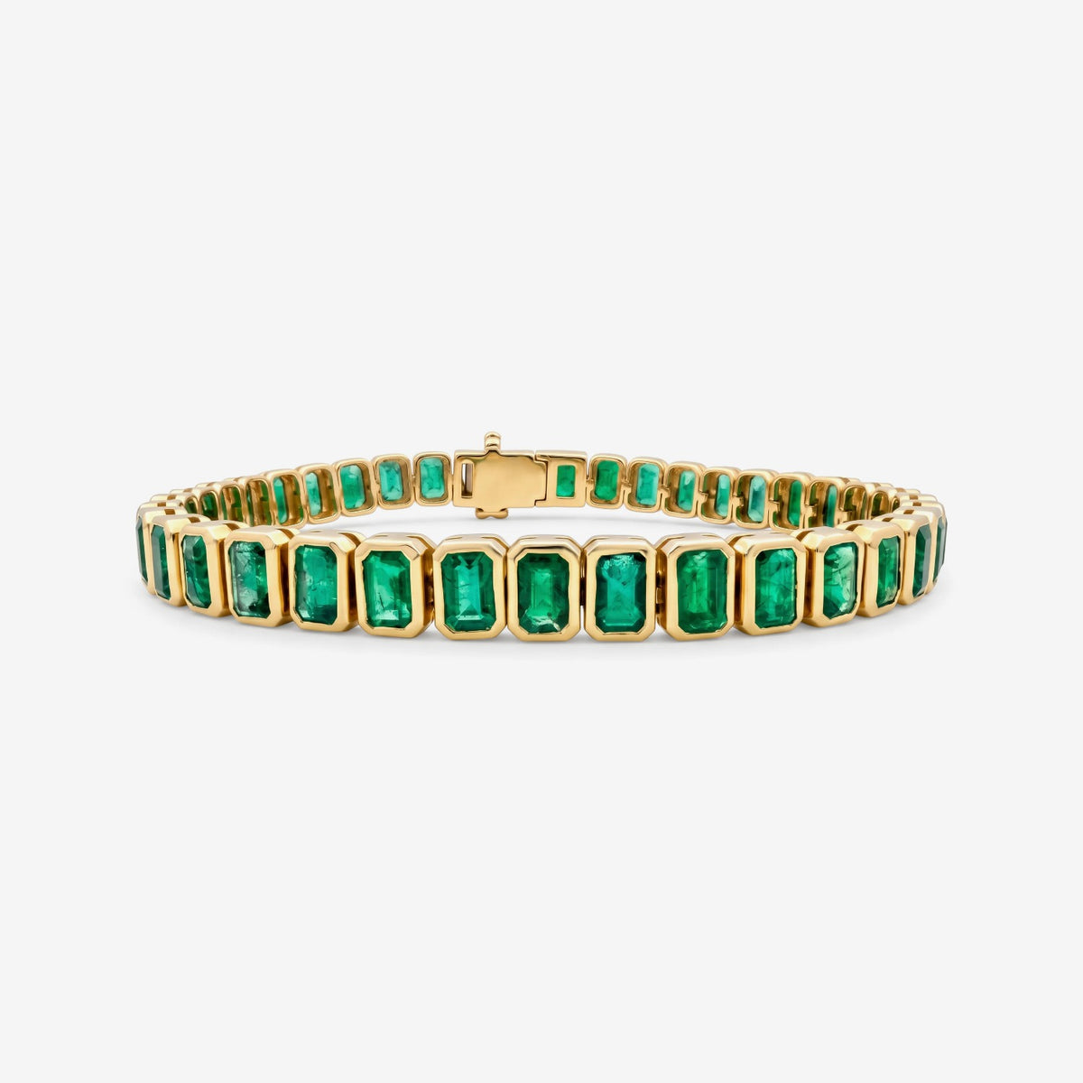 Emerald-Cut Emerald Bezel Tennis Bracelet in 14K Yellow Gold | JJ Jewelry Miami