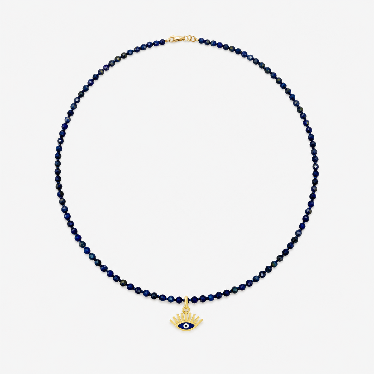 Enamel Evil Eye Pendant in 14K Yellow Gold, on a lapis bead necklace | JJ Jewelry Miami