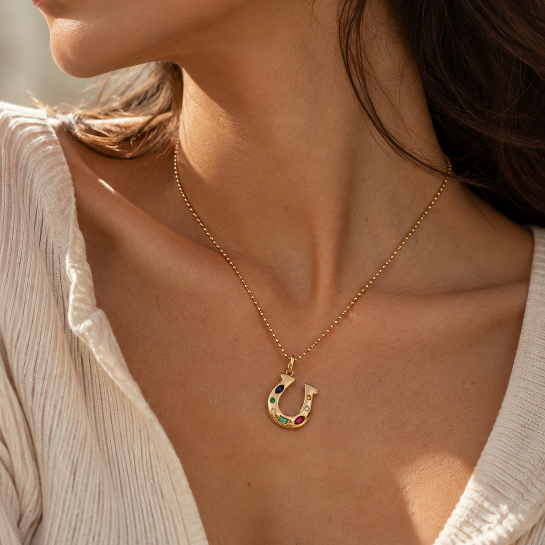 Gemstone Horseshoe Charm Pendant in 14K Yellow Gold worn on a gold bead chain, view 4 | JJ Jewelry Miami