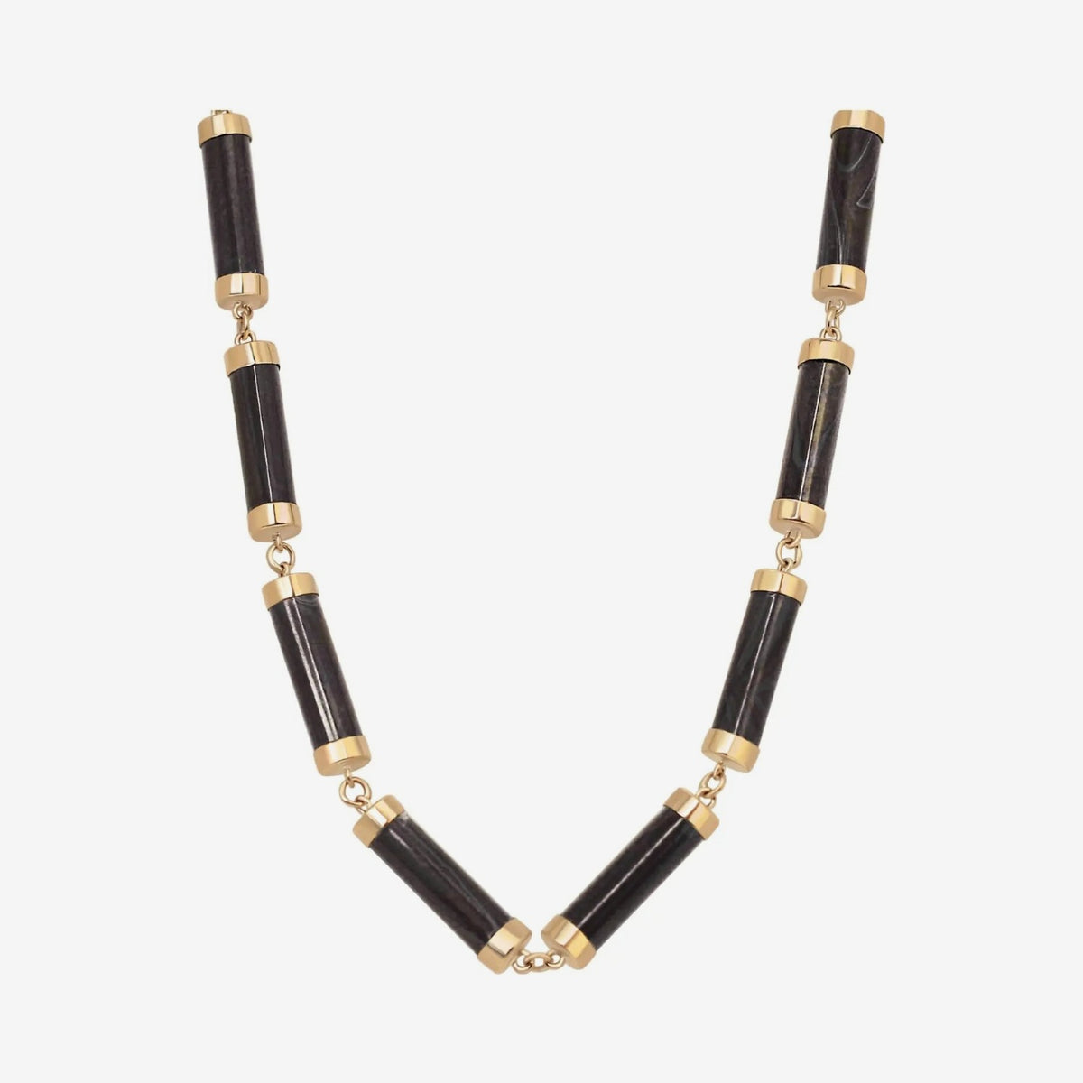 Geometric Cylinder Gemstone Necklace in 14K Yellow Gold, Onyx, gray background | JJ Jewelry Miami