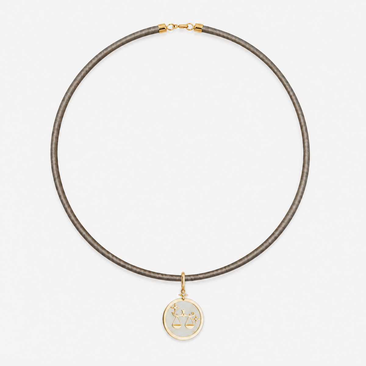 Libra Zodiac Pendant with White Quartz & Diamonds in 18K Yellow Gold, styled on a taupe cord choker | JJ Jewelry