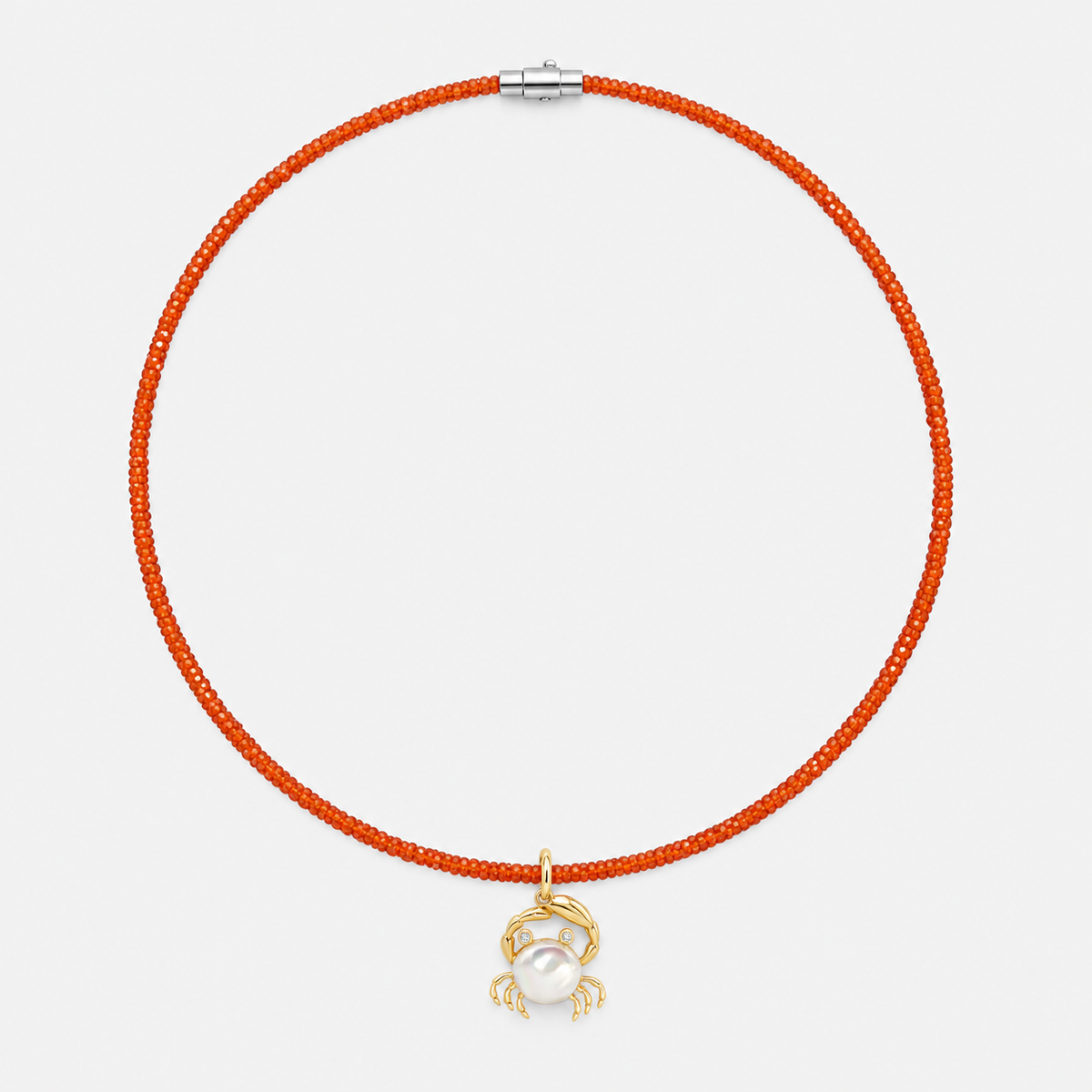 Mother-of-Pearl Crab Pendant with Diamonds in 14K Yellow Gold, on a coral beaded choker | JJ Jewelry Miami