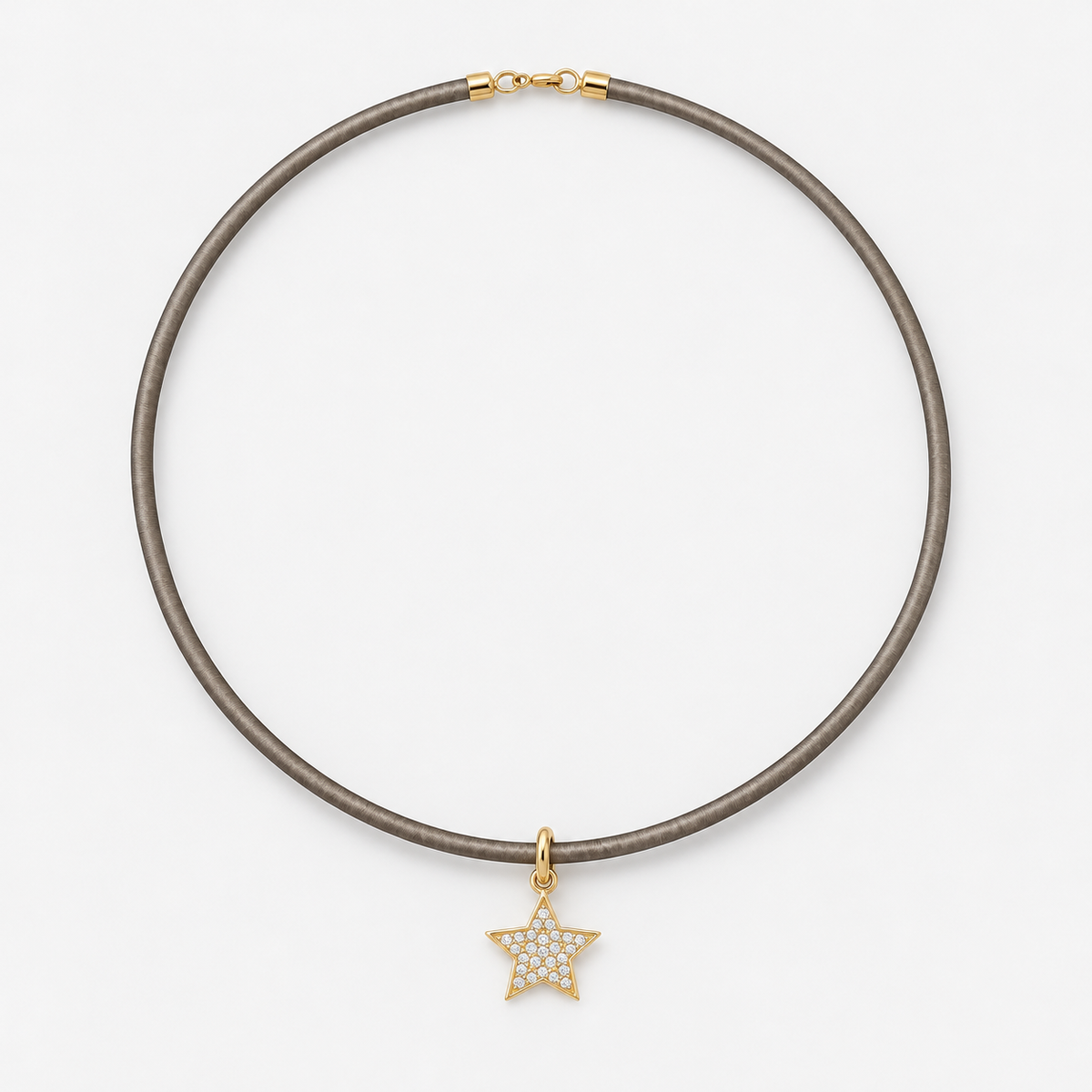 Pavé Diamond Star Pendant in 14K Yellow Gold, styled on a taupe cord choker | JJ Jewelry Miami