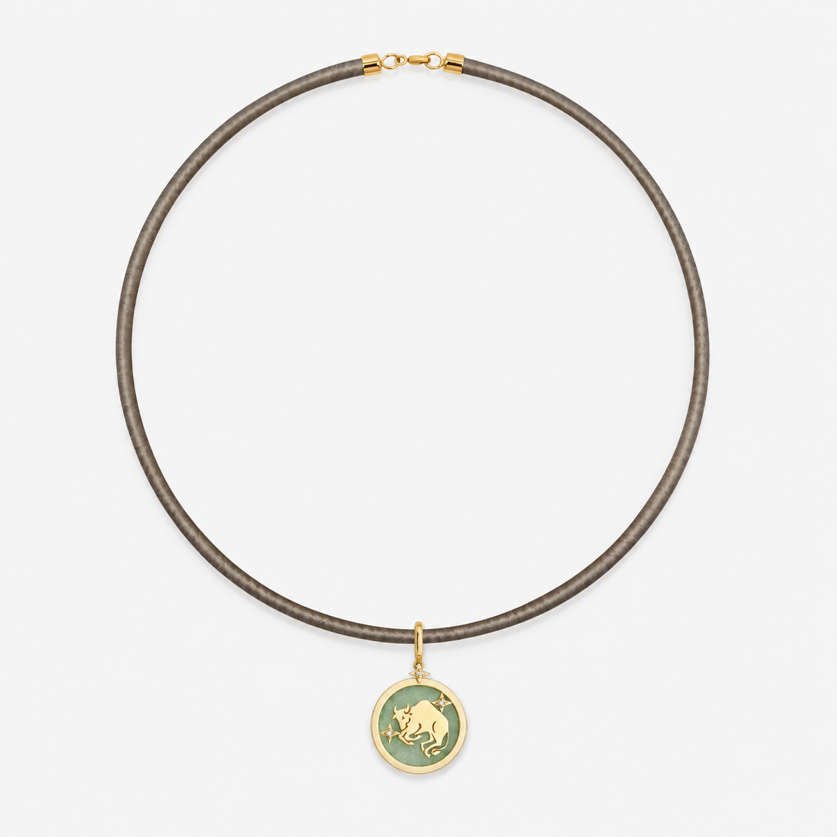 Taurus Zodiac Pendant in 18K Yellow Gold with Green Quartz & Diamonds, styled on a taupe cord choker | JJ Jewelry Miami